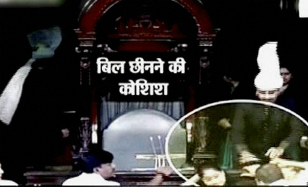 TDP MP M. Venugopal Reddy (TDP) broke the mike of the House Secretary General - PTI/TV grab TDP MP M. Venugopal Reddy (TDP) broke the mike of the House Secretary General - PTI/TV grab